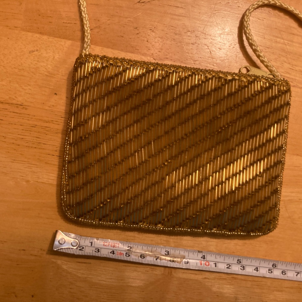 SAS Gold bugle bead evening bag with cord ,satin interior made in Macau.